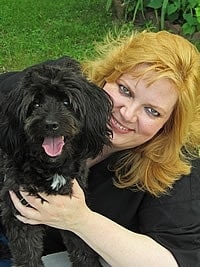 Team member Christie with pet dog